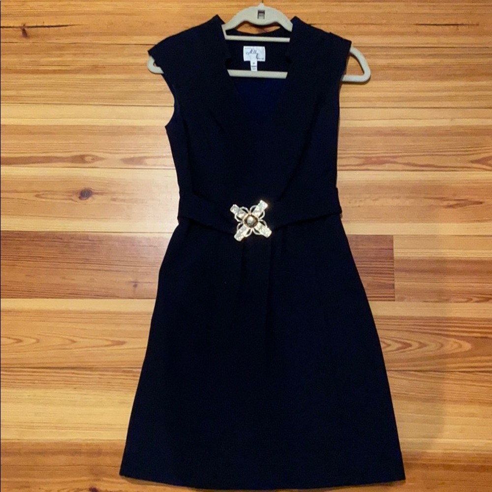 Navy lined Milly dress with gold medallion